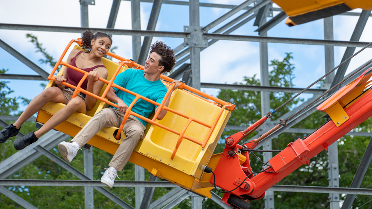 Two guests riding the Downdraft