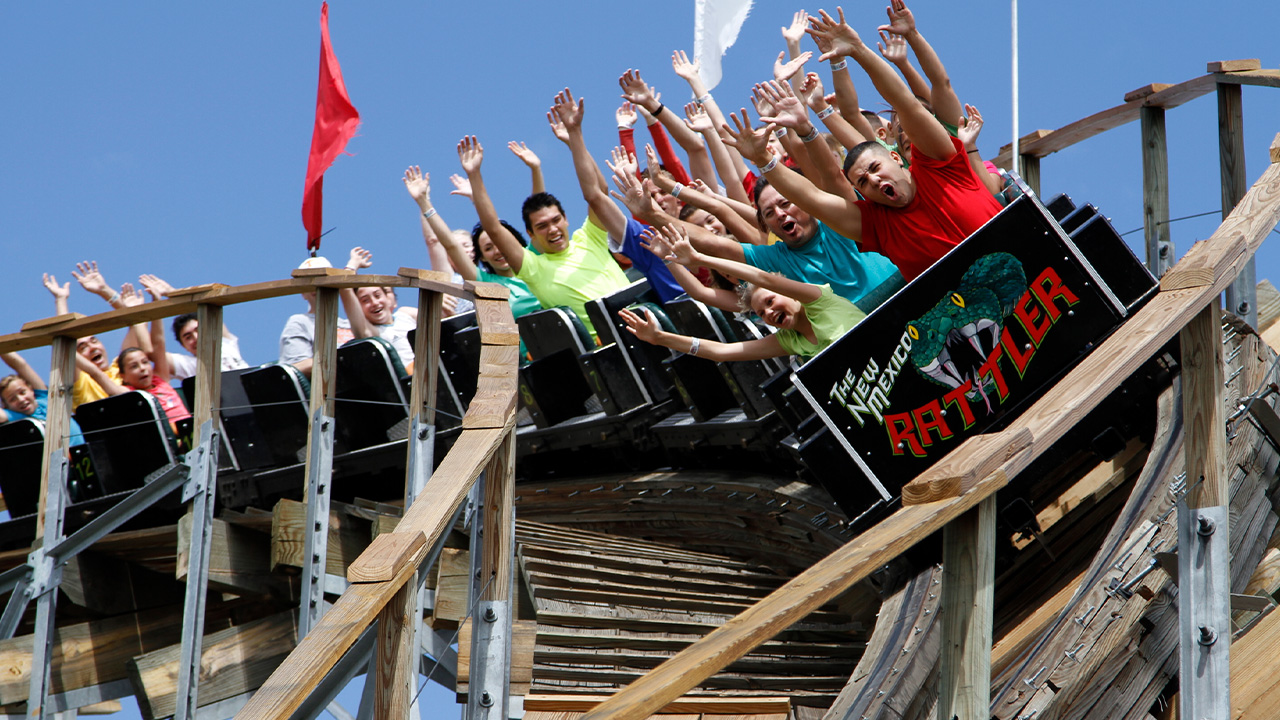 Guests riding the Rattler Roller Coaster during the day